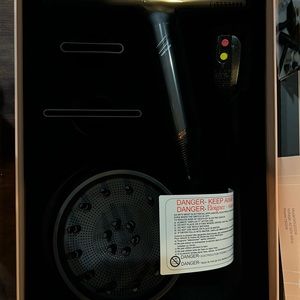 - Brand New professional SRI Q hair dryer.